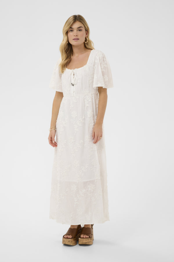 Cream Zammi Maxi Dress, flowing full-length dress with a stylish design,  textured floral embroidery perfect for elegant occasions and casual wear.