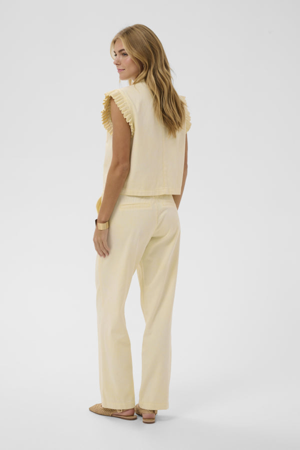 Cream Lorra yellow waistcoat vest, featuring a tailored fit, ruffle detail  and button details in faded lemon yellow.