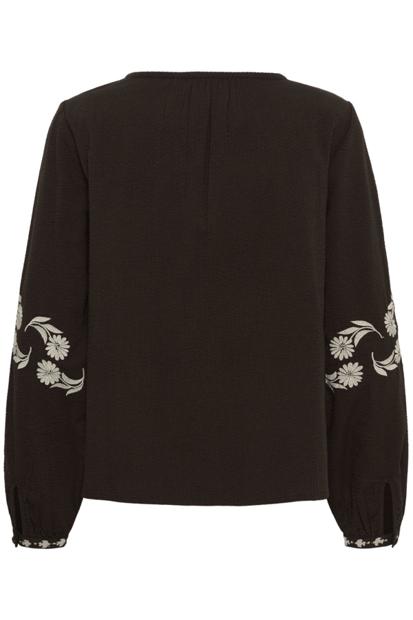 Cream Patulie Folk Embroidered Blouse with colorful traditional embroidery and long sleeves, displayed on a plain background.