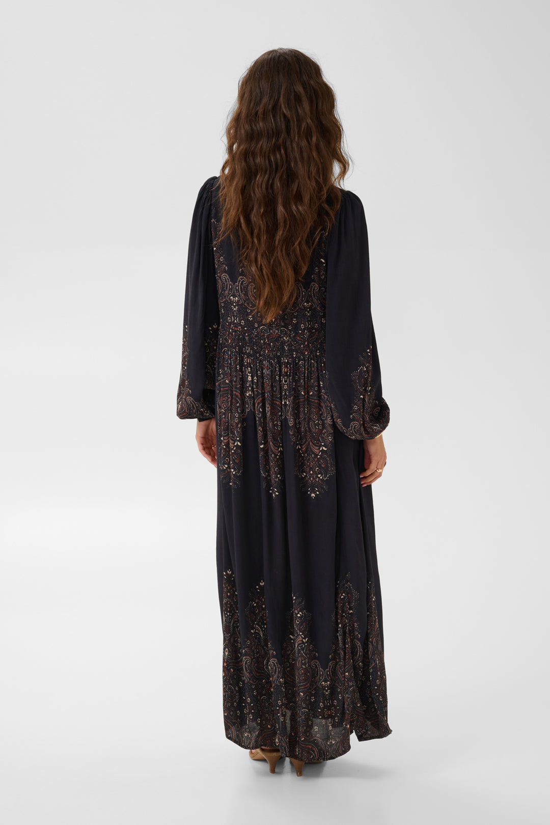 Cream Josia Maxi Dress featuring a flowing silhouette, sleeveless design, and elegant fabric for stylish summer wear.