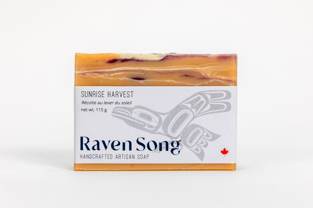 RavenSong Soap & Candle Sunrise Harvest Artisan Hand Soap with citrus and patchouli scent, featuring a rustic soap bar and natural ingredients.