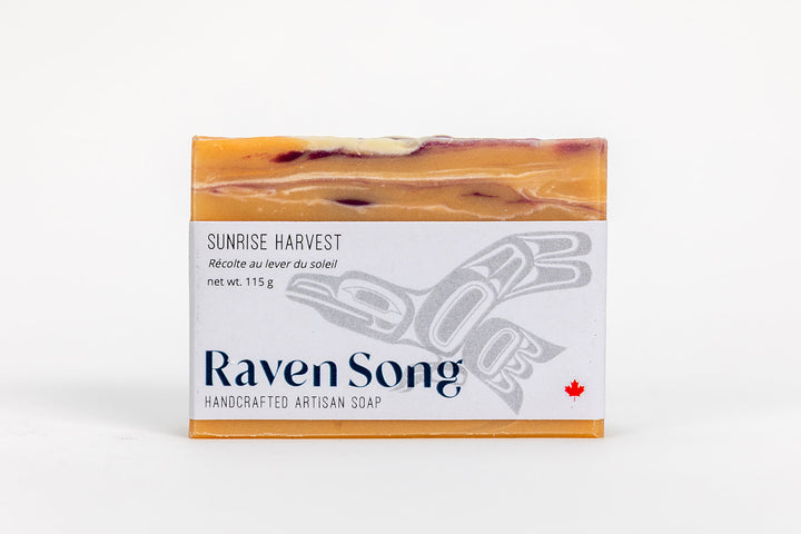 RavenSong Soap & Candle Sunrise Harvest Artisan Hand Soap with citrus and patchouli scent, featuring a rustic soap bar and natural ingredients.