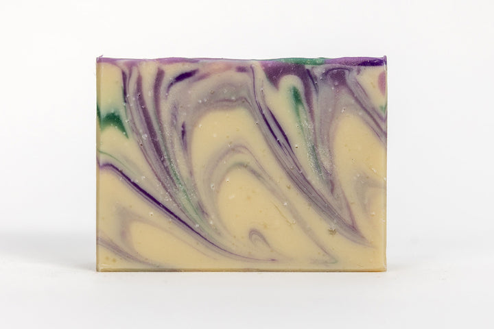 RavenSong Soap & Candle Coastal Lavender artisan soap with BC organic essential oil, showing a bar of lavender-scented soap on a natural background.