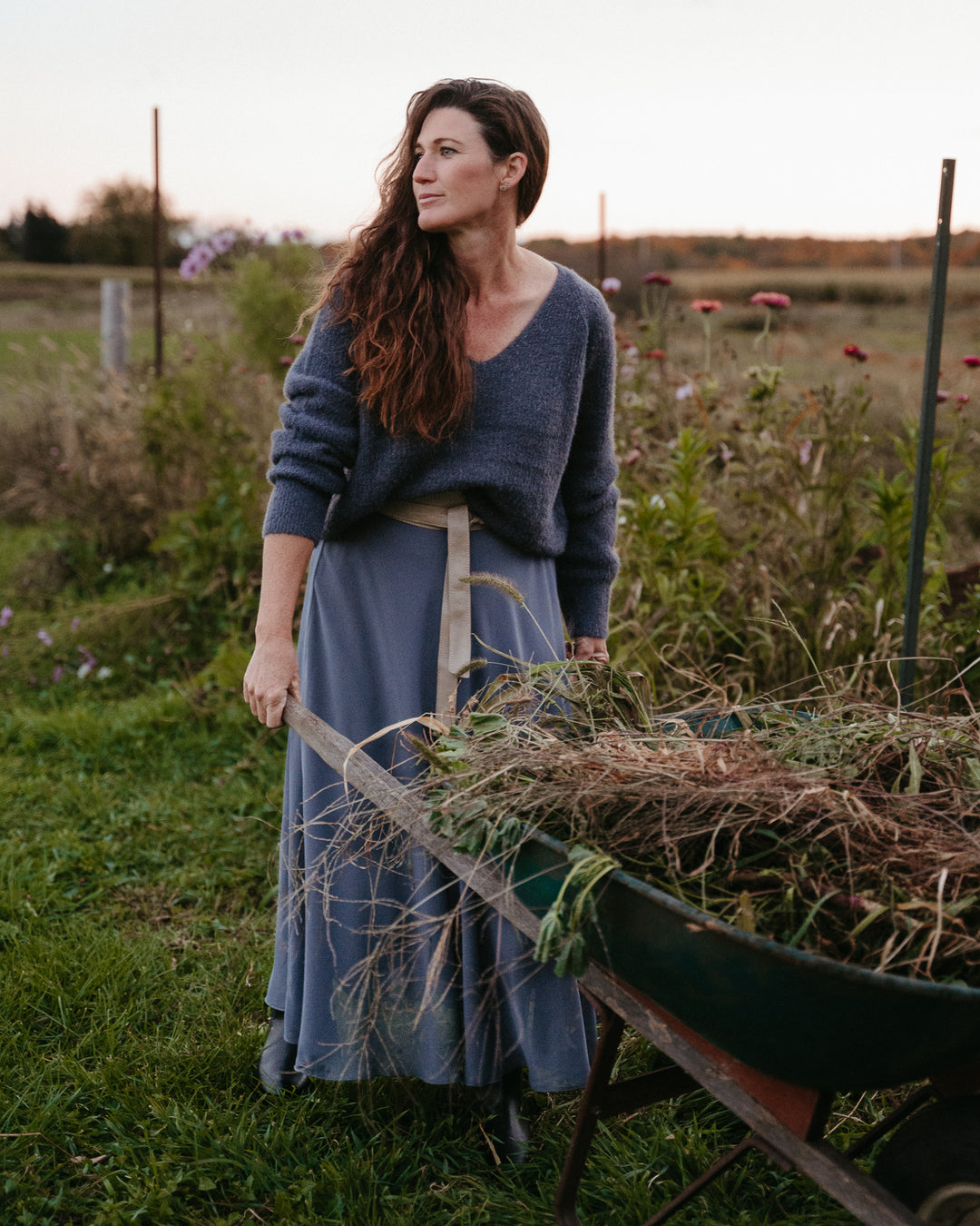 Gentle Fawn Filomena V-neck sweater in Palomino color, soft knit fabric, worn casually with a relaxed fit.