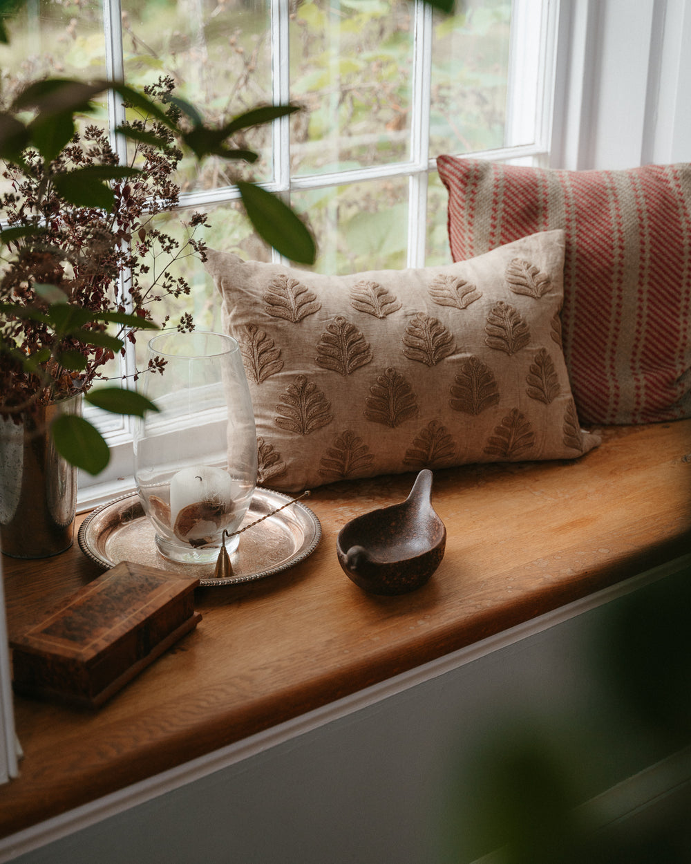 Decorative stoneware bird bowl with debossed design by Creative Co-op, featuring a smooth, rounded shape and detailed bird motif.