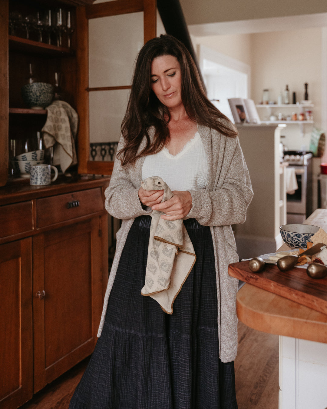 Pokoloko Mia Knit Sweater cardigan in Palomino color, featuring a cozy, textured knit fabric and comfortable fit.