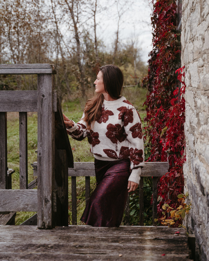 B.Young floral knit sweater featuring colorful mandala floral pattern, long sleeves, and cozy knit fabric.