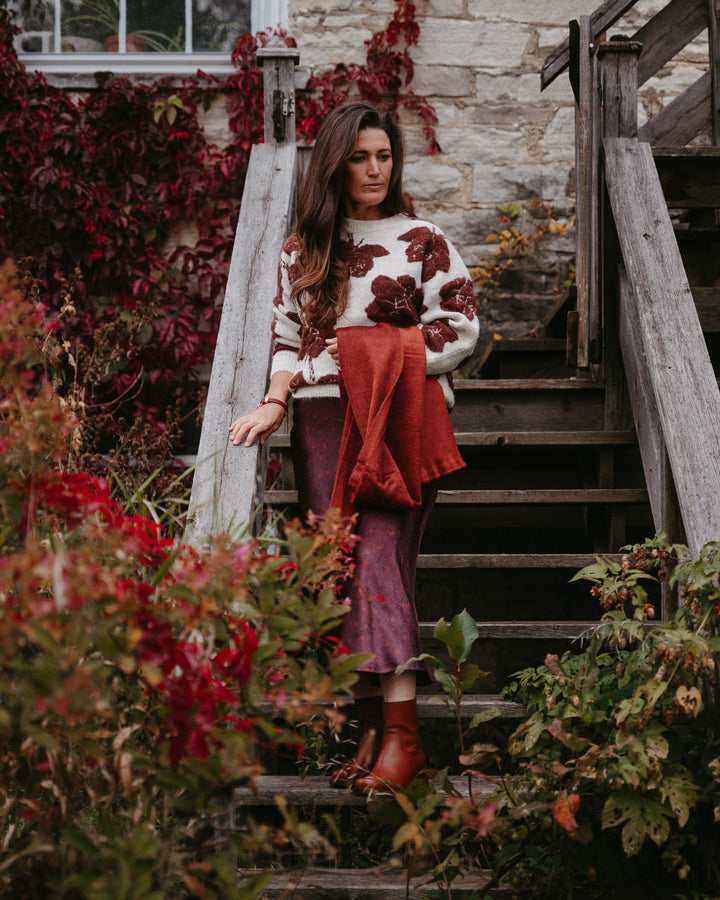 B.Young Manda floral knit sweater featuring colorful floral patterns on a cozy, stylish sweater for women.