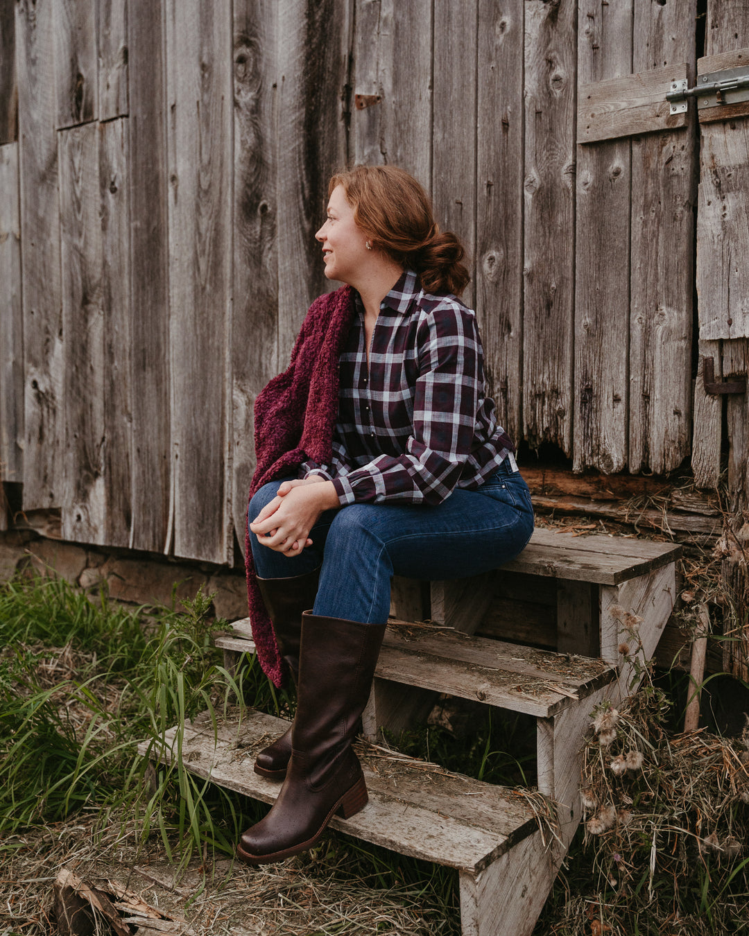 Molly Bracken Bordeaux Teddy Vest hanging on a wooden hanger, soft faux fur texture and classic design, stylish and cozy.