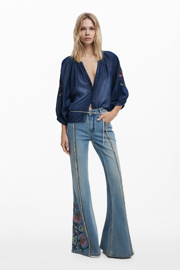 Desigual Aurora Bloom denim blouse featuring floral embroidery and a casual, stylish fit for everyday wear.