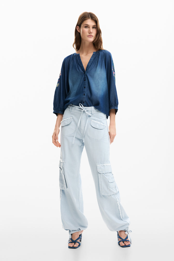 Desigual Aurora Bloom denim blouse featuring floral embroidery and button-up front, casual and stylish for everyday wear.