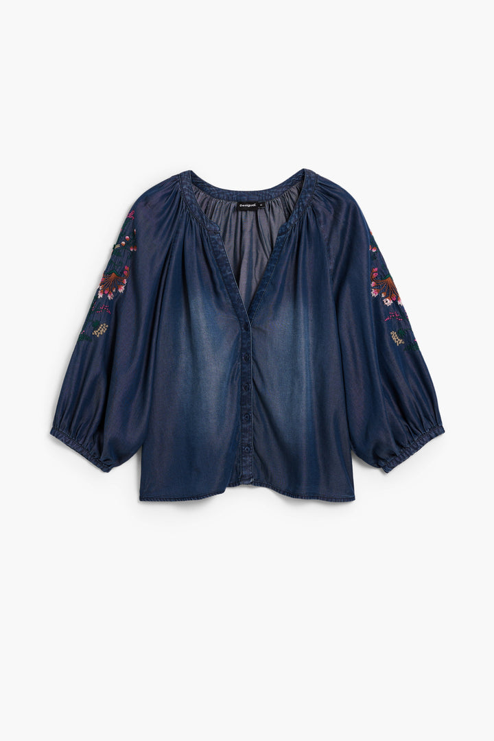 Desigual Aurora Bloom denim blouse featuring floral embroidery and a relaxed fit, displayed on a hanger.