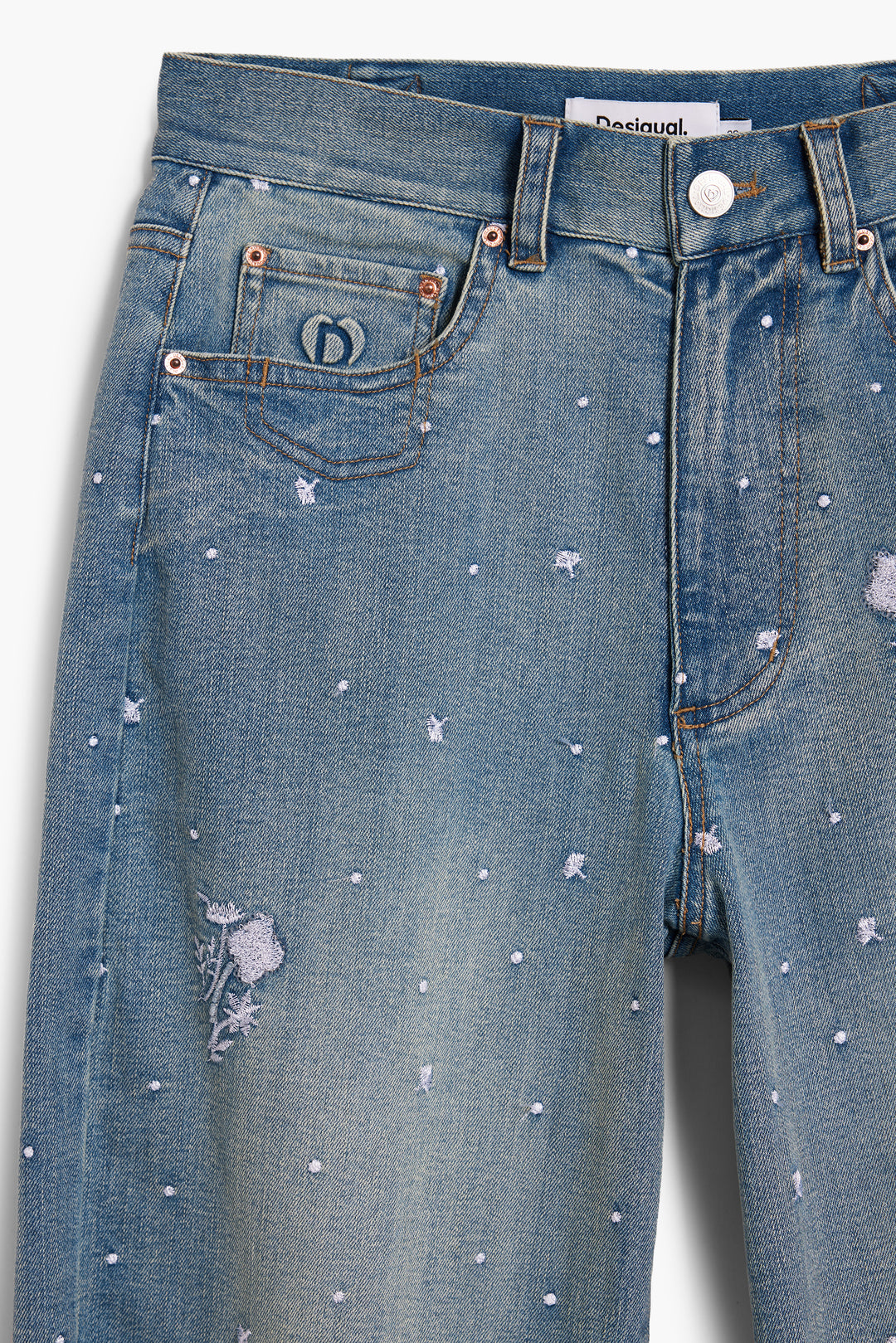 Desigual Cecilia Barrel Jeans featuring a relaxed fit and stylish design, displayed on a hanger with detailed floral stitching.