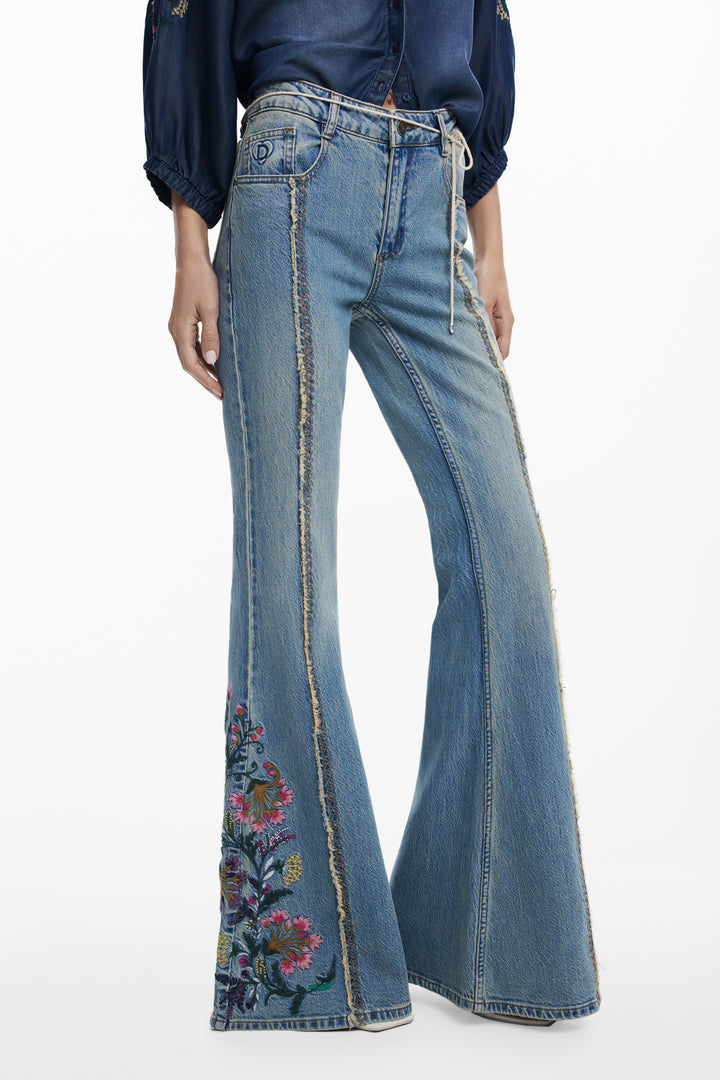 Desigual Festival Fields embroidered flare jeans featuring colorful floral embroidery and high-waisted fit.