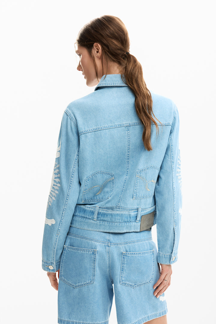 Desigual Paloma embroidered denim jacket featuring light blue  floral embroidery and classic denim design for a modern boho stylish look.