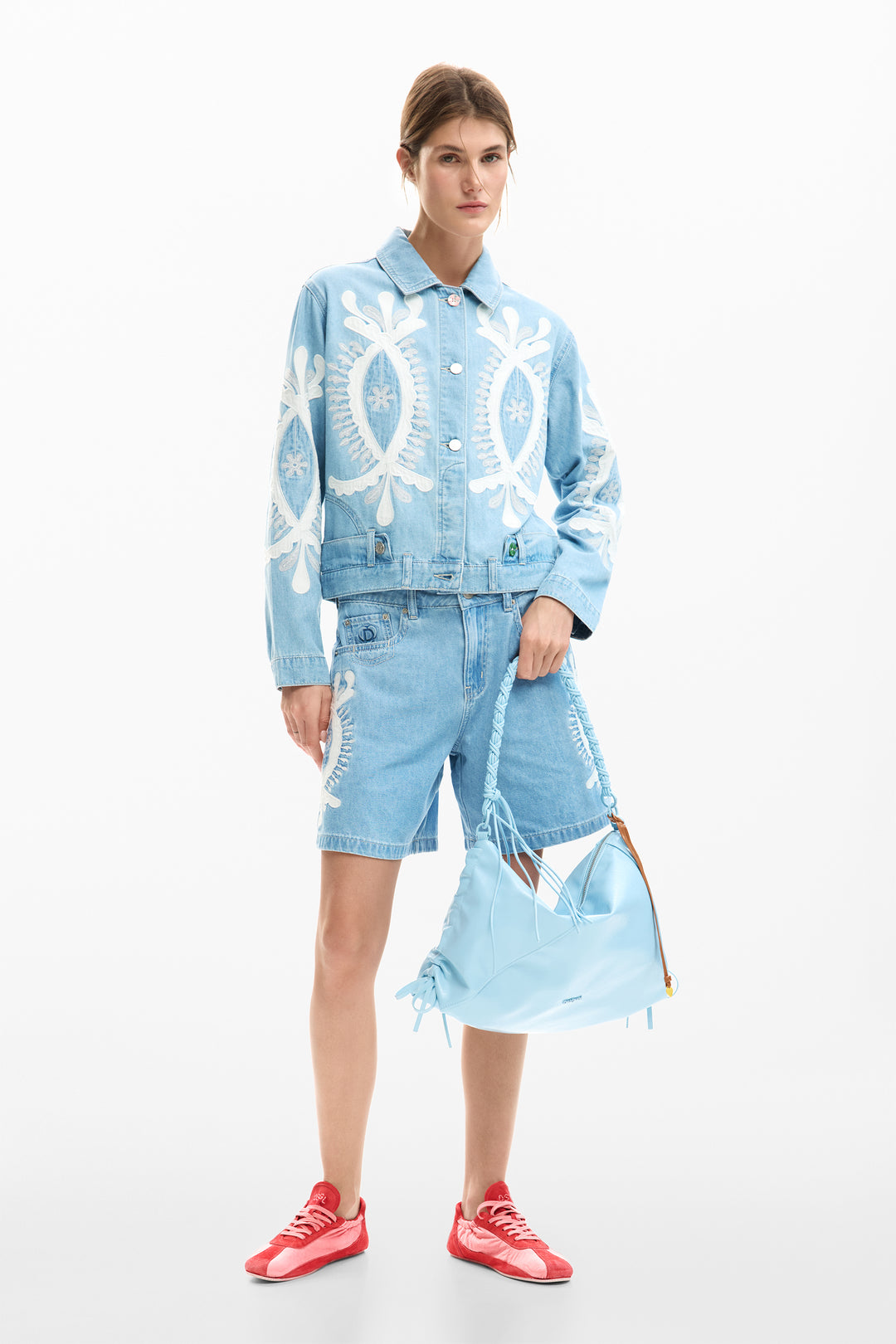 Desigual Paloma embroidered denim jacket with modern floral embroidery on classic blue denim, stylish and casual modern boho outerwear.