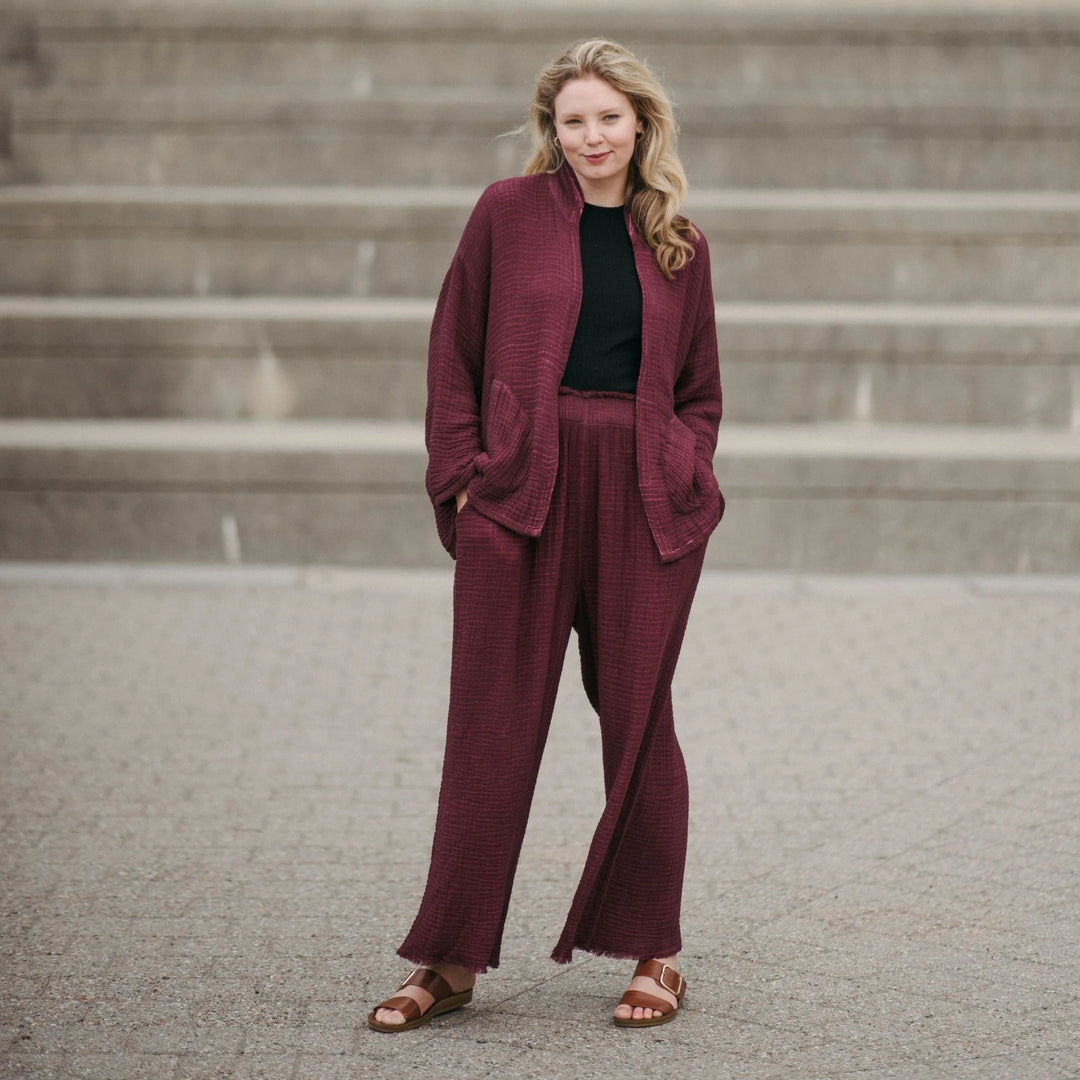 Cranberry crinkle cotton palazzo pant by Pokoloko featuring wide-leg design and layered crinkle fabric for a relaxed, flowy fit.