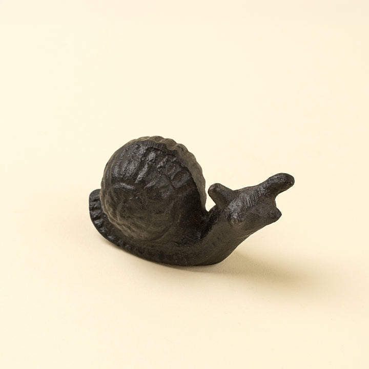 Indaba cast iron snail decor figure featuring a detailed, rustic snail design perfect for home or garden decoration.