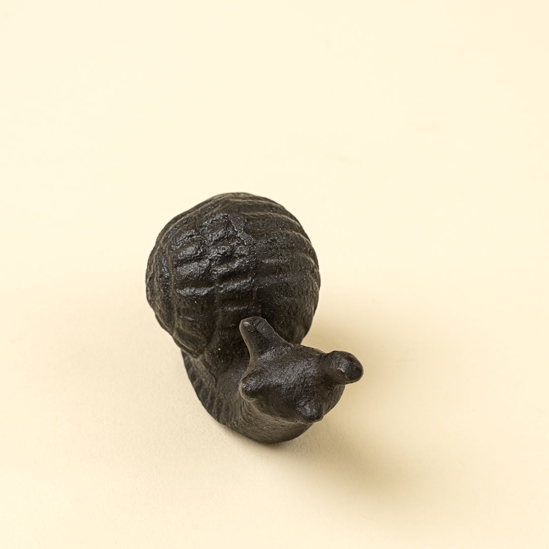 Indaba cast iron snail decor figure with detailed textured shell and realistic snail shape for home decoration.