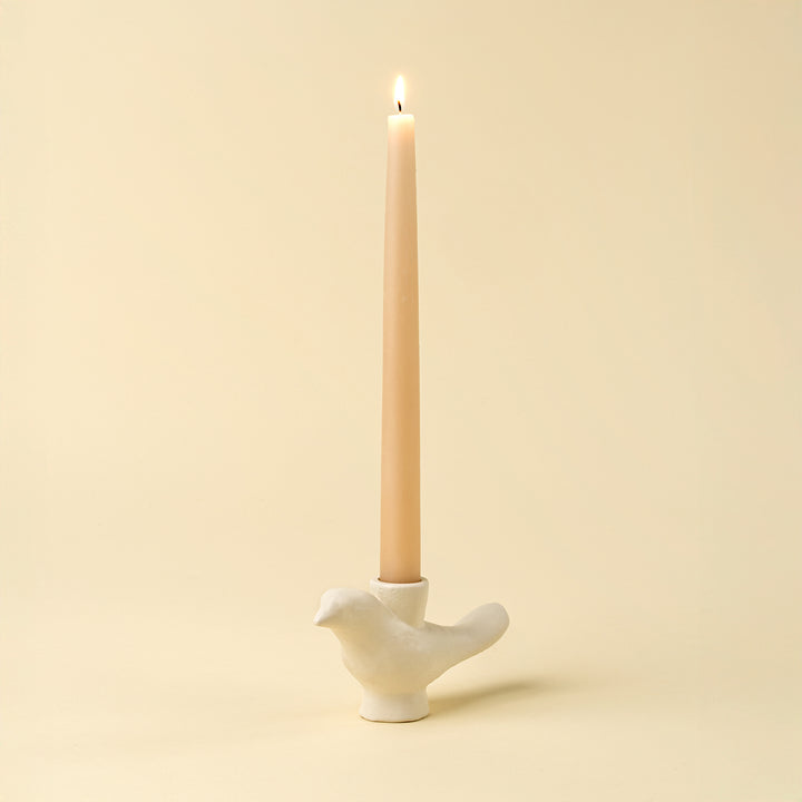 Indaba Wren Candle Holder featuring a sleek, modern bird design with a metal finish for elegant home decor.
