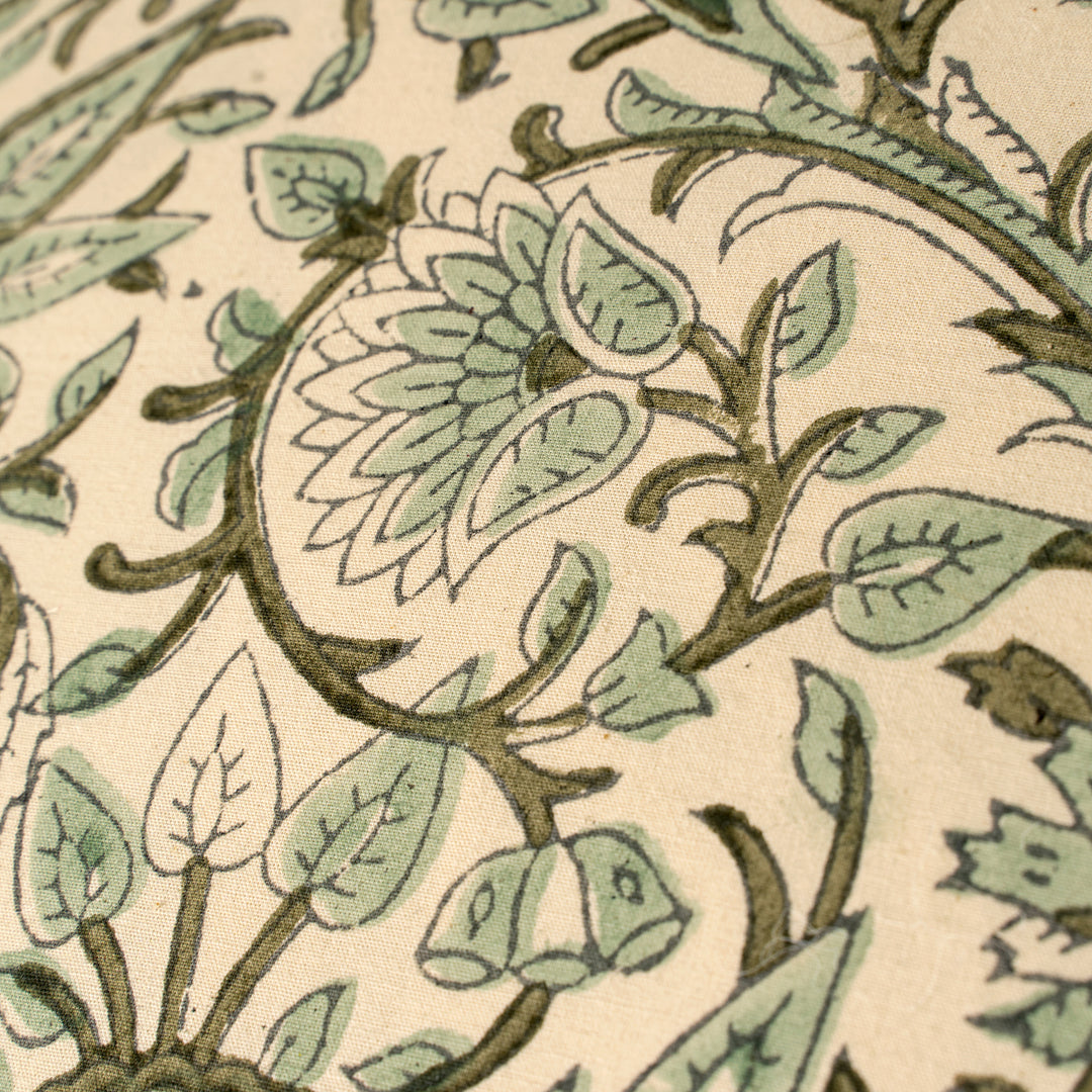 Indaba Rupi block print throw pillow with vibrant green floral patterns and soft fabric, ideal for decorative home accents.