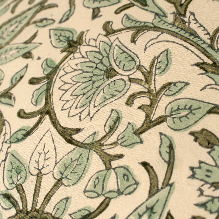 Indaba Rupi block print throw pillow with vibrant green floral patterns and soft fabric, ideal for decorative home accents.
