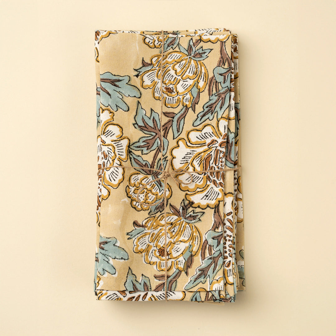 Indaba Lirien block print cotton napkins featuring vibrant floral patterns, perfect for table setting and home decor.