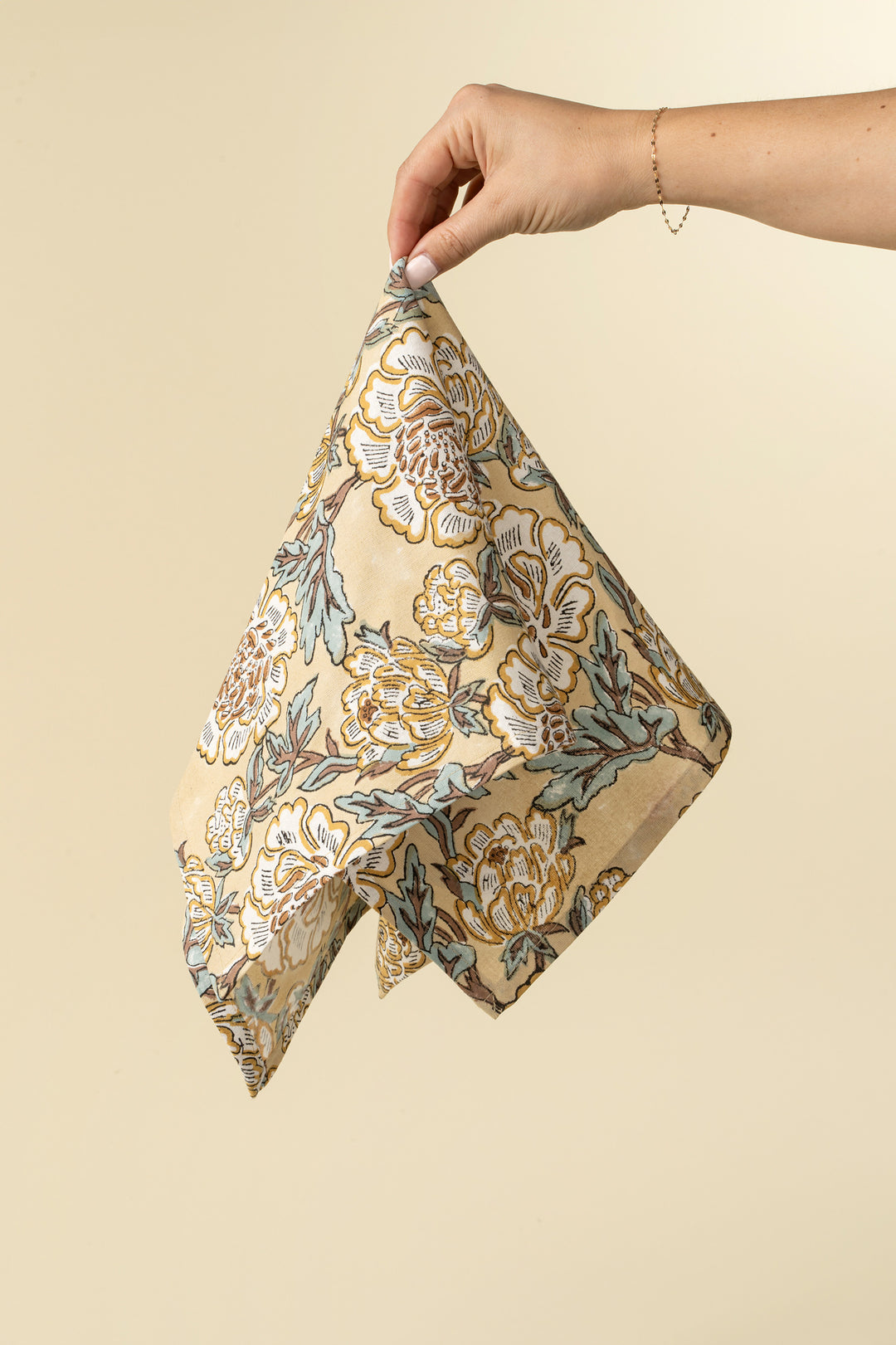 Set of Lirien block print cotton napkins by Indaba featuring vibrant, floral patterned fabric for stylish table setting.