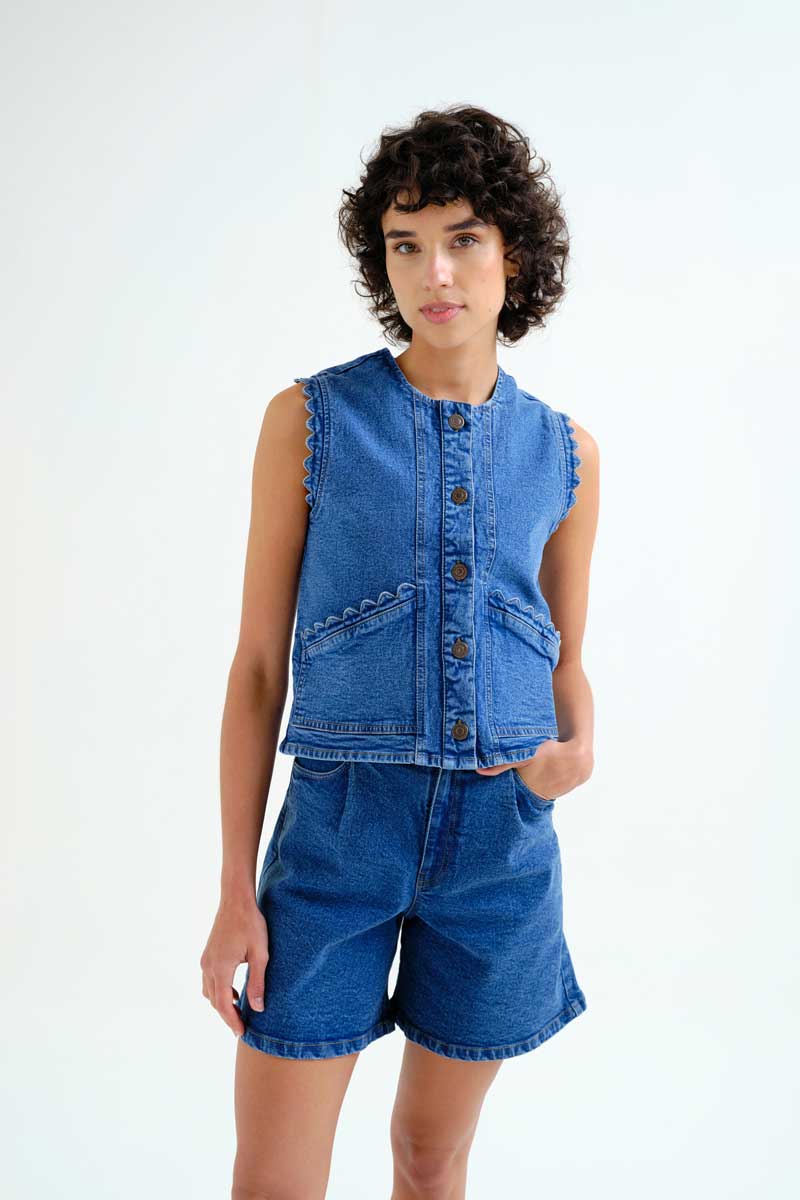 Compania Fantastica Pocketful of Sunshine denim vest with front pockets and button closure, scallop detail casual sleeveless denim fashion piece