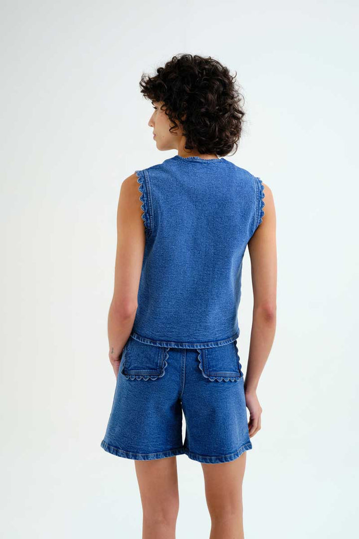 Compania Fantastica Pocketful of Sunshine denim vest with front button closure and stylish patch pockets.
