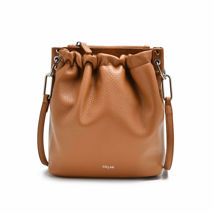 Colab Florence Bucket Bag with adjustable strap and stylish design, crafted from durable vegan leather material for everyday use.