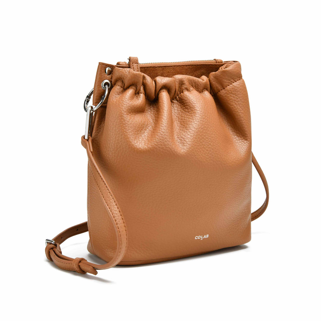 Colab Florence bucket bag featuring a stylish, rounded design with a shoulder strap and versatile interior for everyday use.
