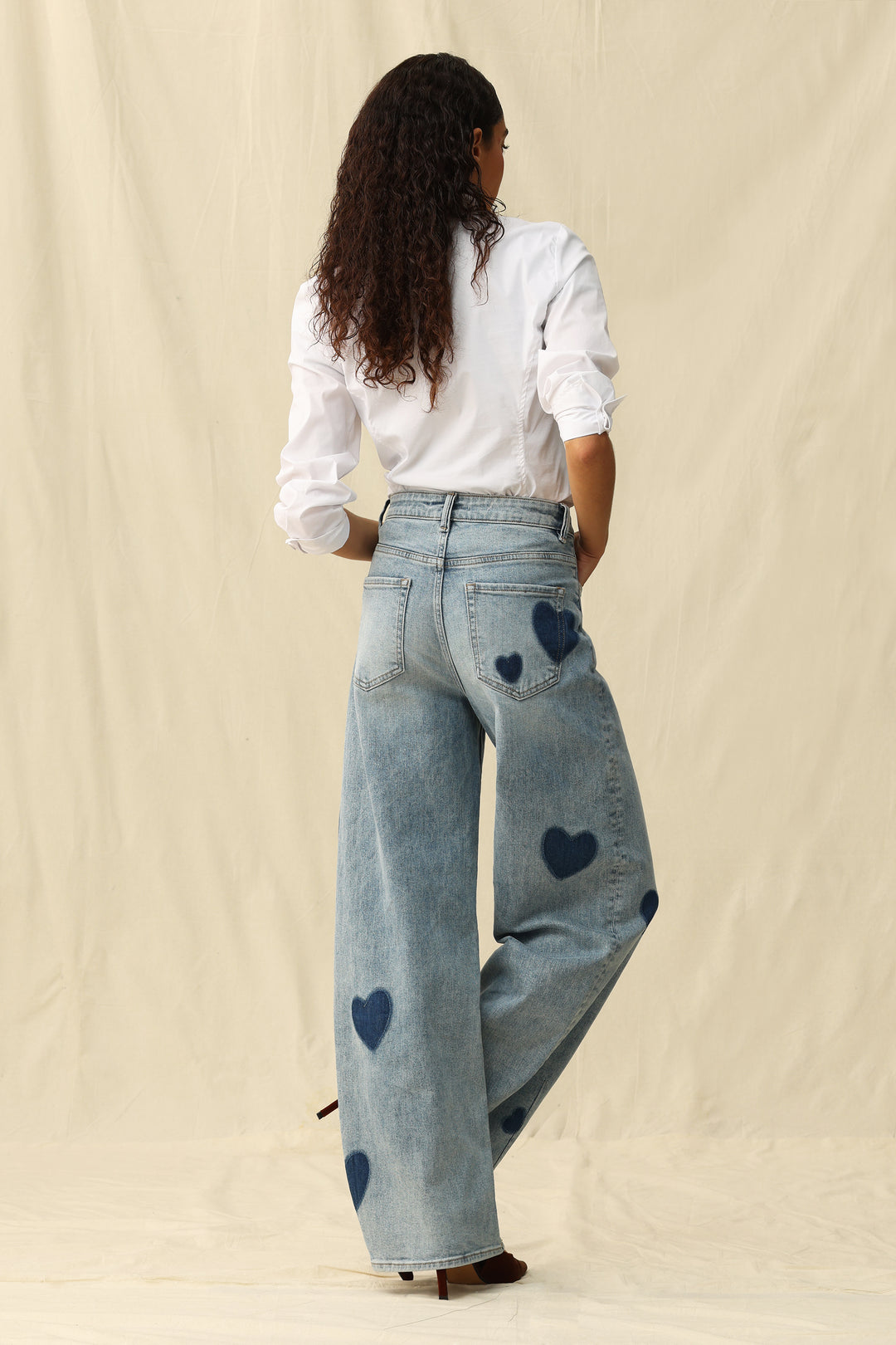 Bayeas Rosalind Heart Print high-rise barrel jeans featuring a heart pattern and trendy denim design for a stylish look.