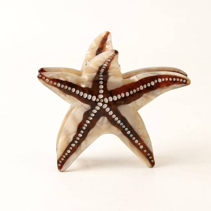 LadyJuneAccessories starfish claw clip showcasing a colorful, seashell-inspired design for stylish hair styling.