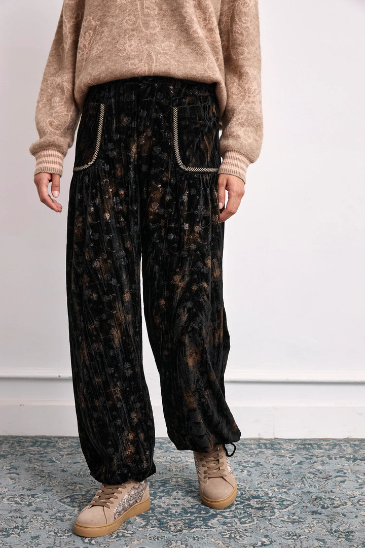 NKN Nekane Amara velvet tie cuff jogger pants in printed velvet fabric, featuring a relaxed fit and stylish design.