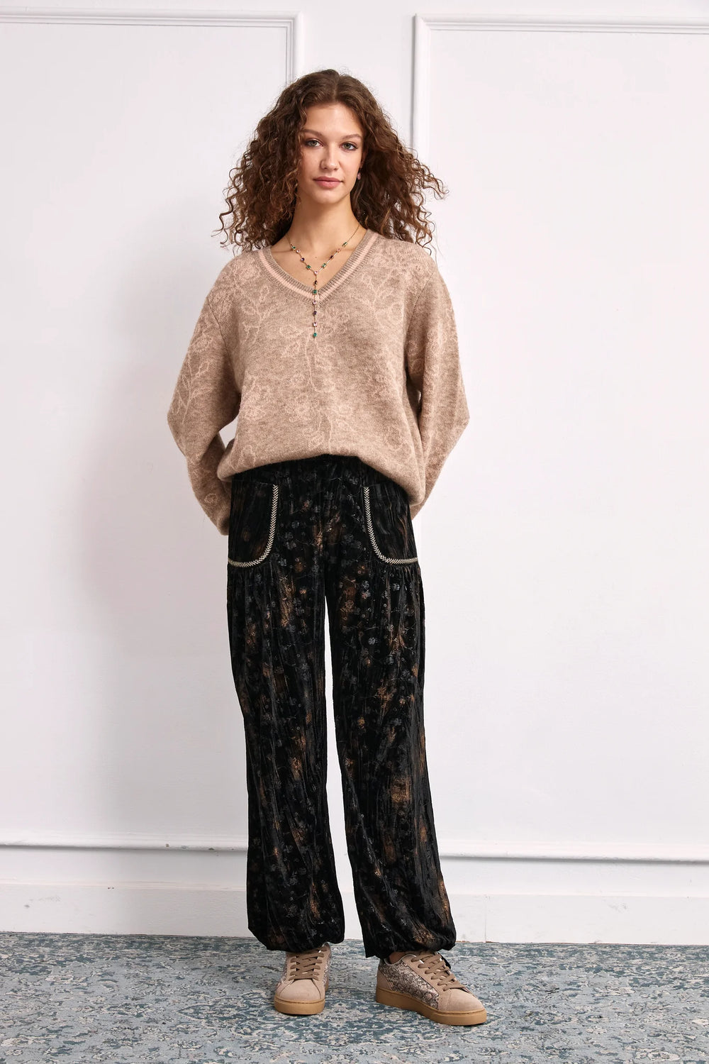NKN Nekane Amara velvet tie cuff jogger pants in printed velvet fabric, featuring a relaxed fit and stylish cuffed ankles.