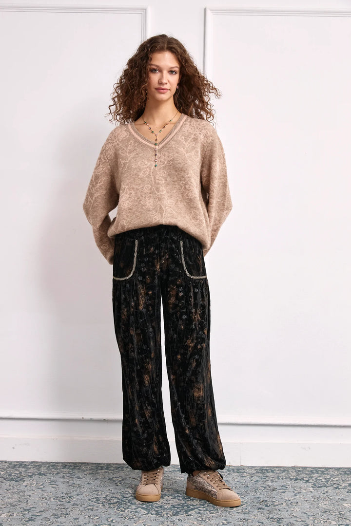 NKN Nekane Amara velvet tie cuff jogger pants in printed velvet fabric, featuring a relaxed fit and stylish cuffed ankles.