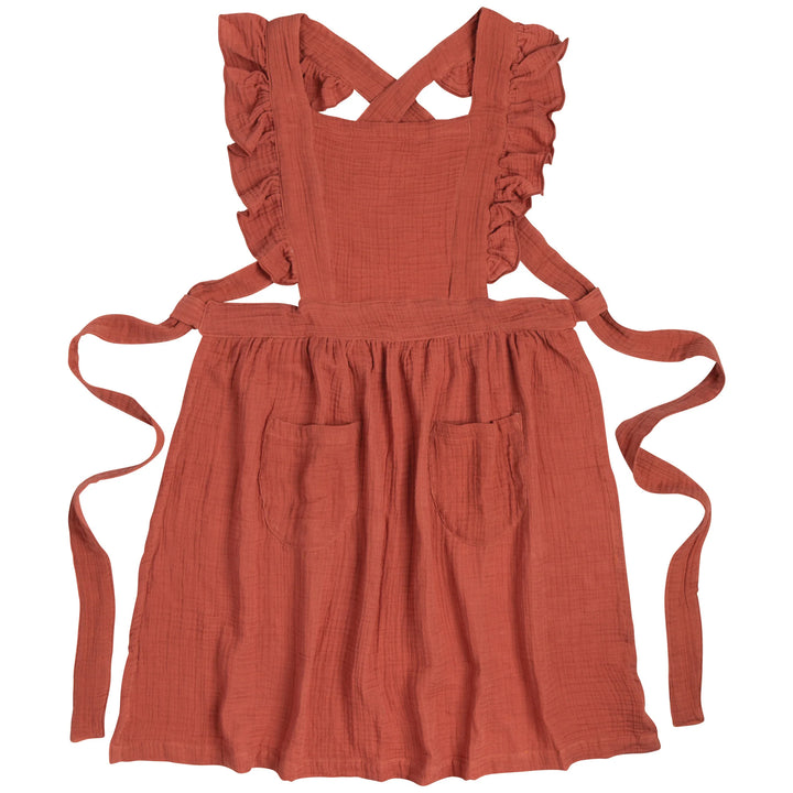 Danica Ada Apron in vibrant fabric with adjustable neck straps and front pockets, perfect for cooking or baking activities.