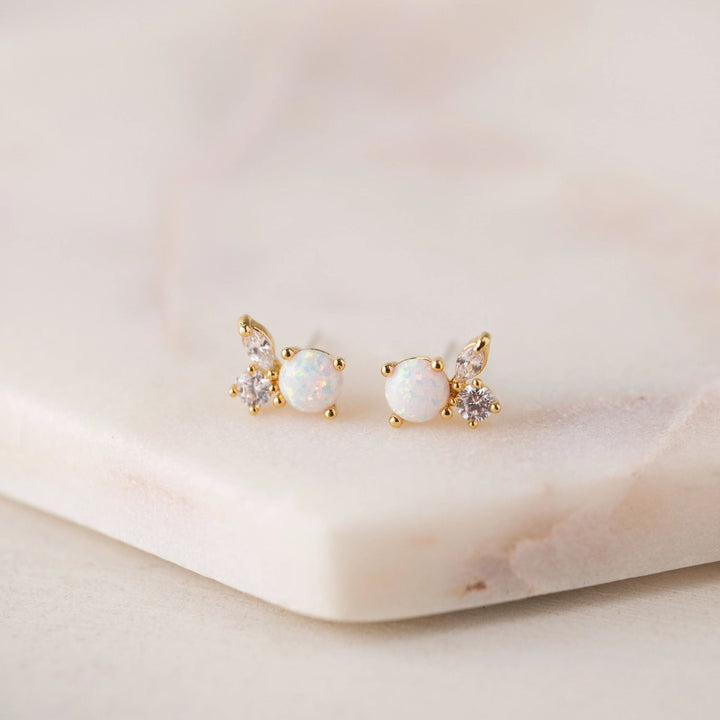 Lover's Tempo Adora Stud Earrings featuring sleek, silver-toned designs with small, sparkling gemstone accents.