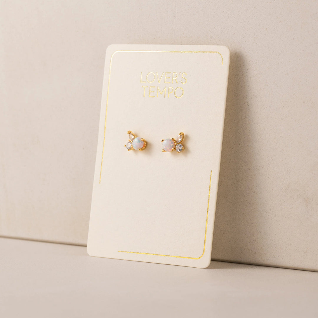 Adora Stud earrings by Lover's Tempo featuring simple, elegant silver studs on a white background