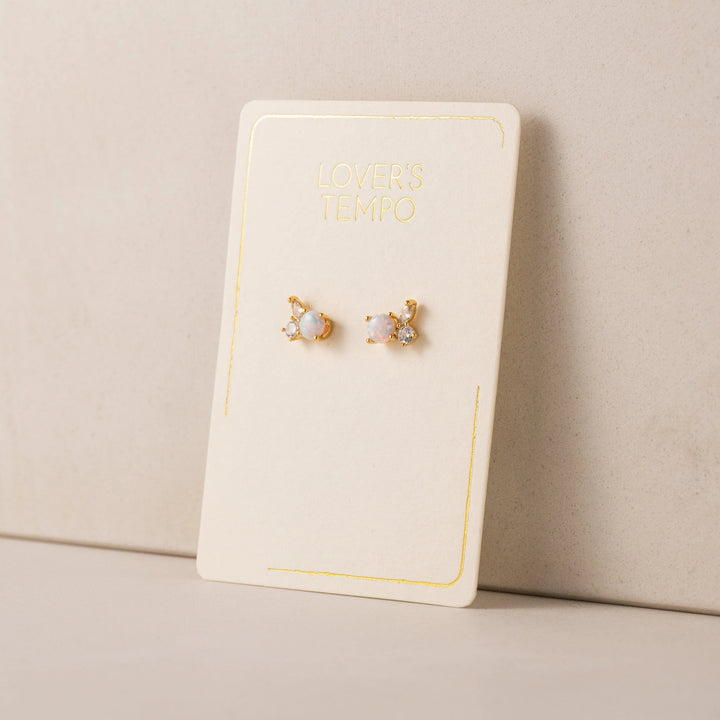 Adora Stud earrings by Lover's Tempo featuring simple, elegant silver studs on a white background