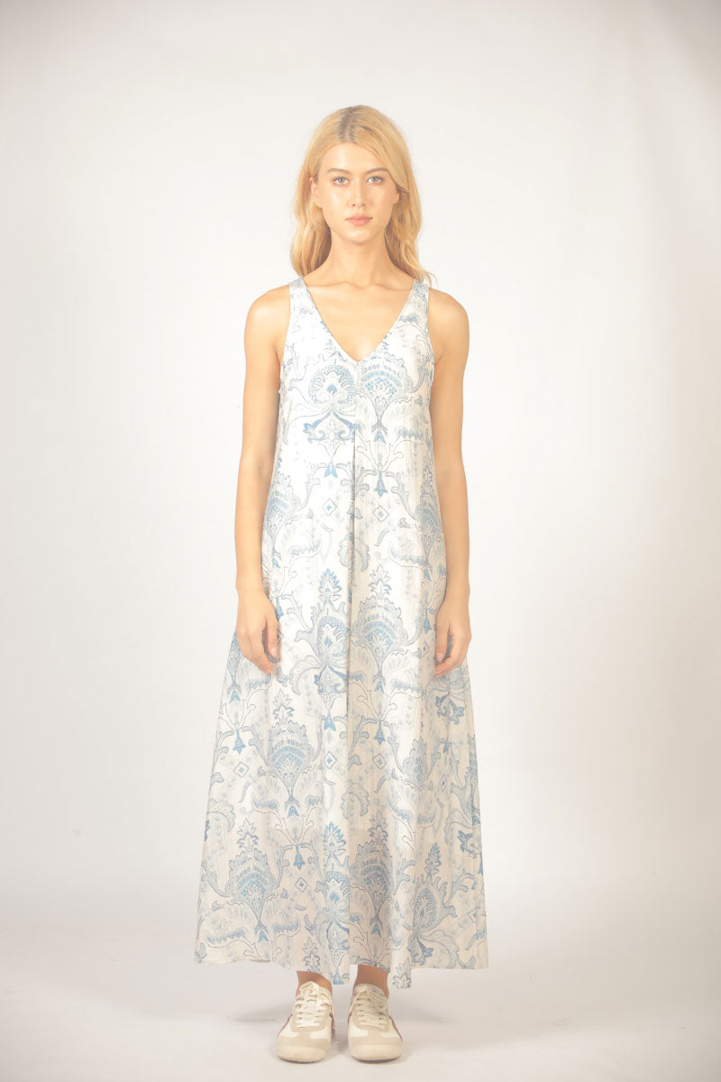 Woman wearing a floral dress on a white background