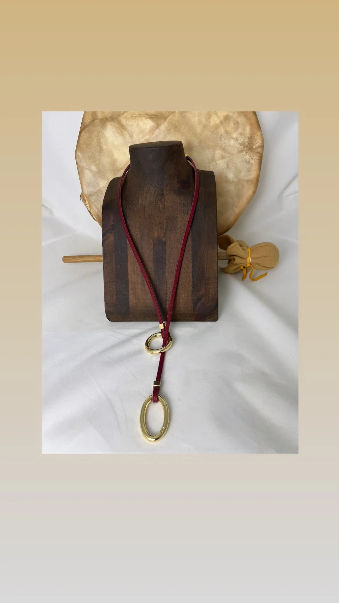 Lofttan Avril Slim Necklace featuring a red and gold design, with delicate chain and elegant pendant for stylish accessorizing.