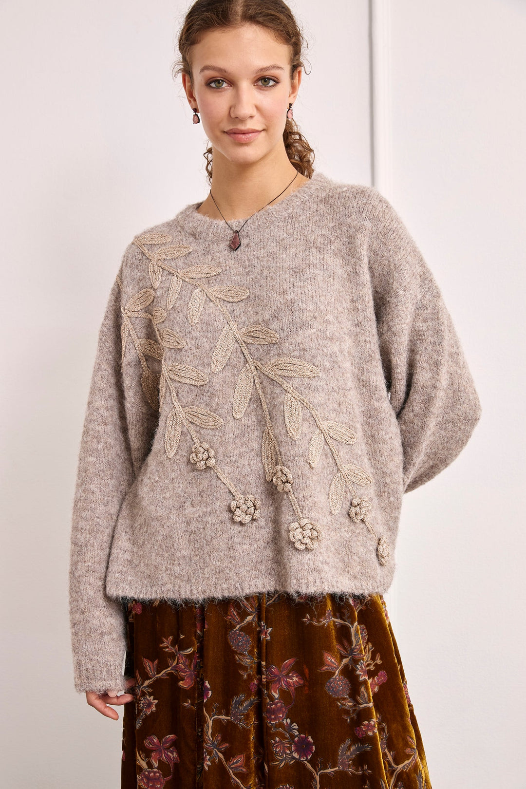 NKN Nekane Asel floral applique knit sweater featuring embroidered floral details and a cozy, stylish design.
