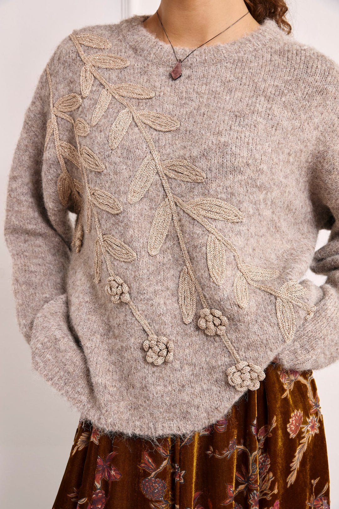 NKN Nekane Asel floral applique knit sweater featuring embroidered floral details and a cozy, stylish design.