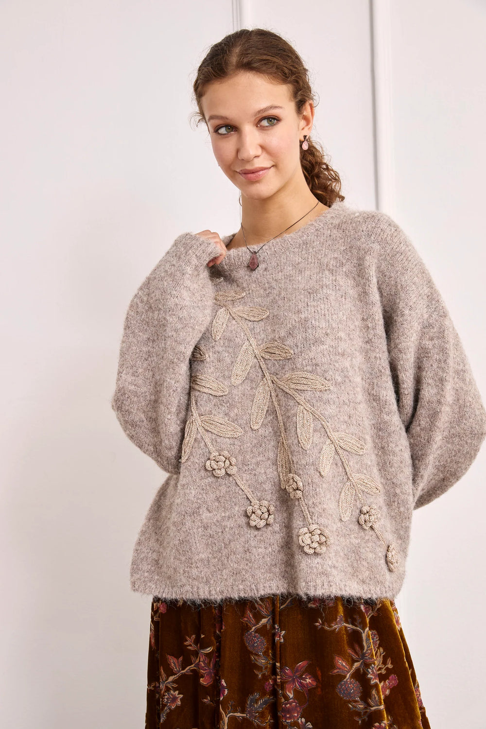 NKN Nekane Asel floral applique knit sweater featuring embroidered floral designs on a cozy pullover style.