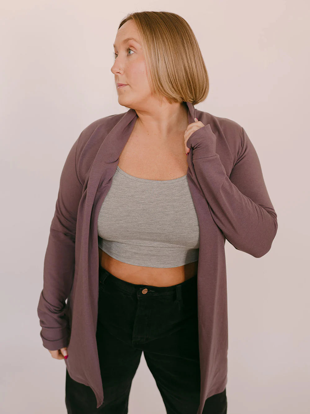 Blondie Apparel Britan Bamboo Cardigan draped over a model, showcasing its soft, lightweight bamboo fabric and stylish open-front design.