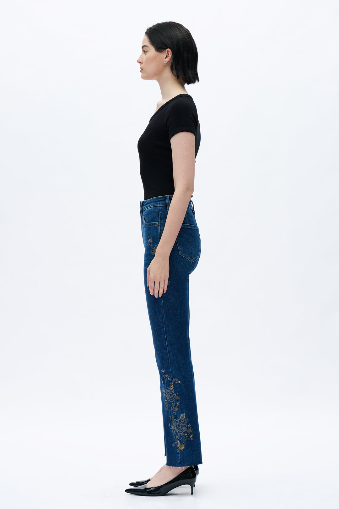 Bayeas Wildflower Trail wide-leg jeans featuring a relaxed fit, floral embroidery detail, and classic dark denim styling.