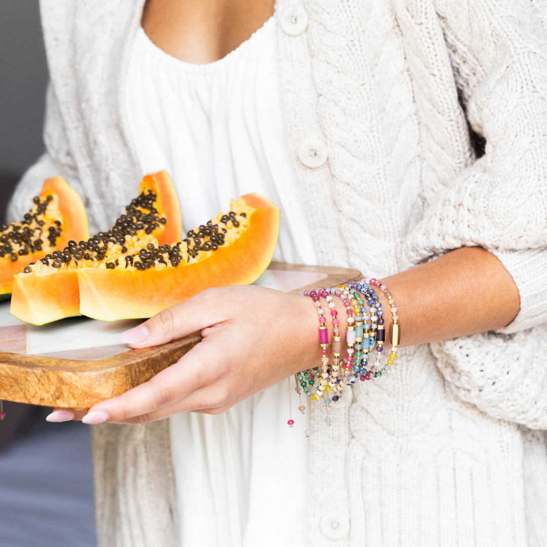 Scout Chakra Glow Beaded Bracelet featuring multicolored beads and a radiant aura-inspired design.