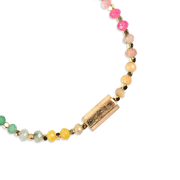 Scout Chakra Glow Beaded Bracelet featuring colorful aura-inspired beads and adjustable cord for a stylish, spiritual accessory.